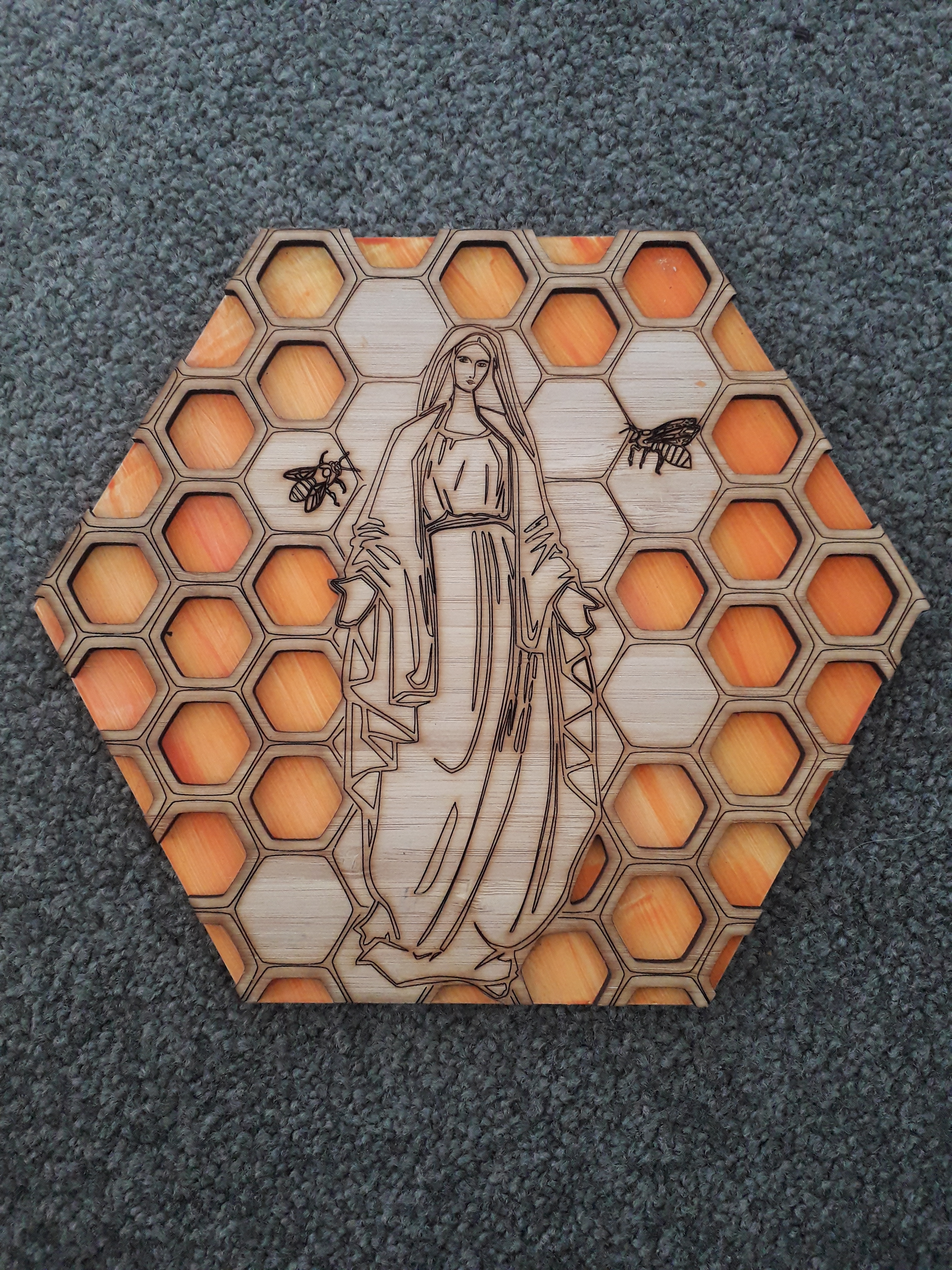 Mary and Bees wall art Virgin Mary and bees on honeycomb pattern on orange background, lasercut
